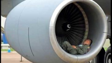 Funny Army Sleeping In Airplane Jet Turbine Picture